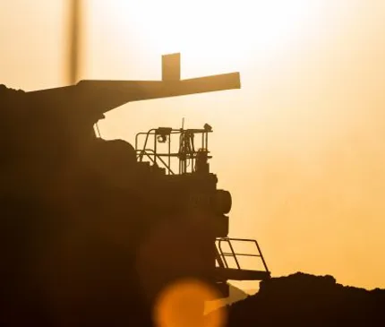 sunset and outline of mining machinery NAIF progresses north Queensland power network project to due diligence