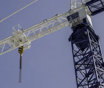 View From Below Of A Blue And White Construction Crane At JCU Engineering And Innovation Place Site